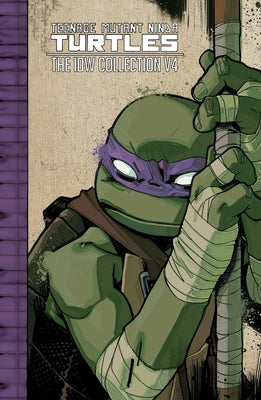 Paperback of Teenage Mutant Ninja Turtles: The IDW Collection Volume 4 by IDW Publishing, featuring colorful comic book cover art.