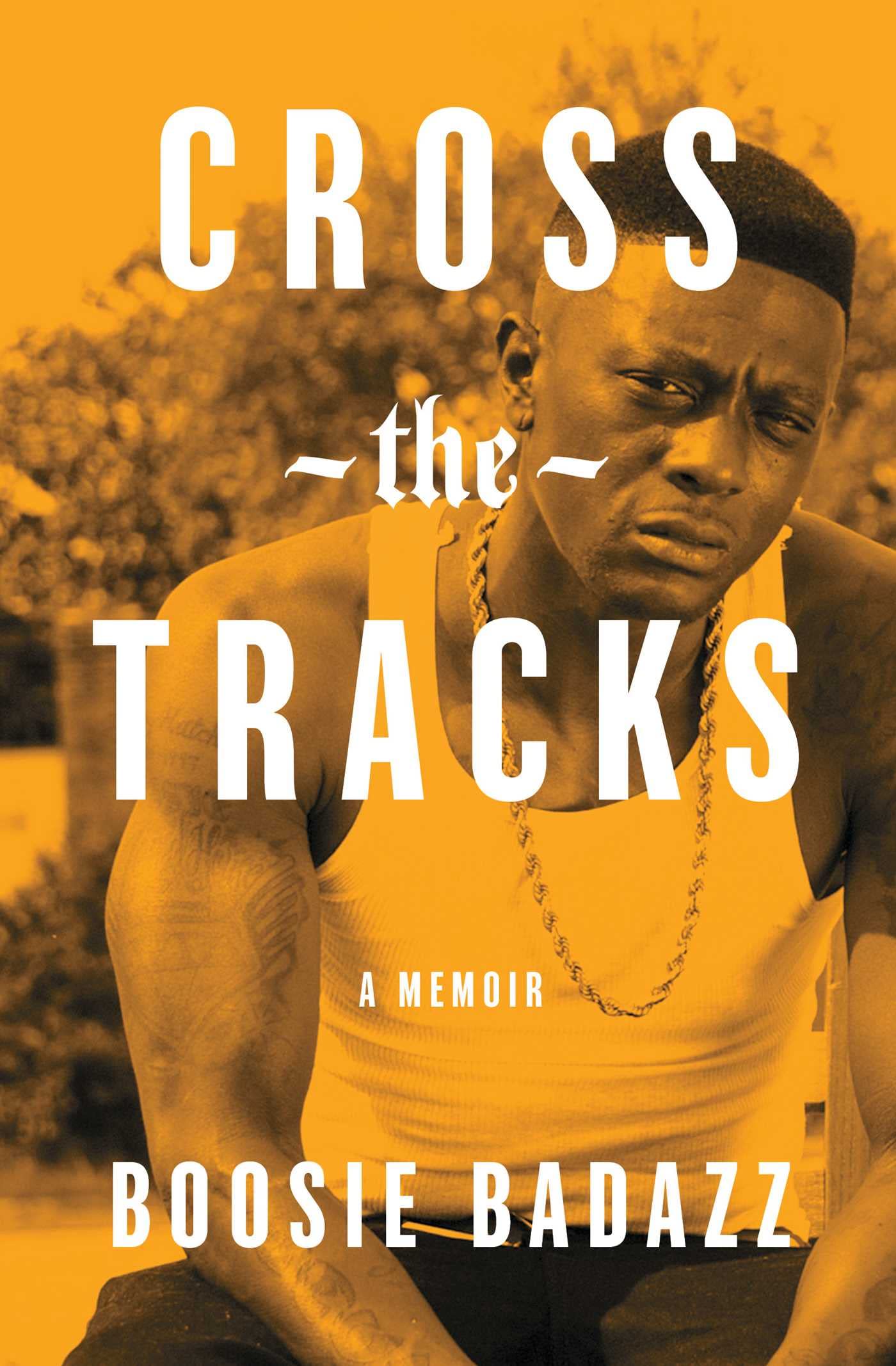 Paperback of "Cross the Tracks: A Memoir" by Gallery Books, showing the book cover with title and author details.
