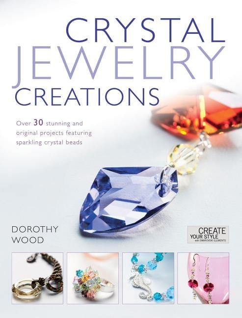 Open paperback book showcasing crystal jewelry creation projects with sparkling crystal beads and detailed step-by-step instructions.