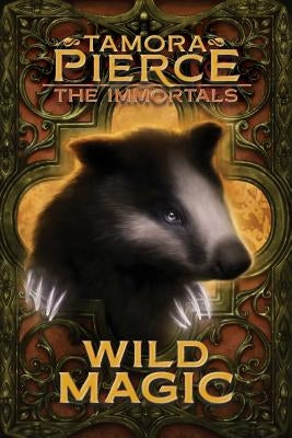 Paperback of Wild Magic by Atheneum Books for Young Readers, featuring colorful fantasy-themed cover art.