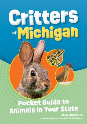 Paperback Critters of Michigan pocket guide by Adventure Publications showing colorful illustrations of local animals.