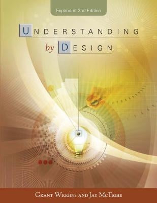 Paperback book titled "Understanding by Design" by ASCD, featuring a cover with educational design elements.