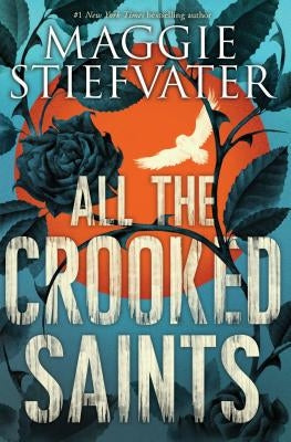 Paperback copy of "All the Crooked Saints" by Scholastic Press, featuring a colorful cover with artistic illustrations.