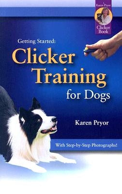 Paperback book titled "Clicker Training for Dogs" by Sunshine Books, showing a dog training guide with colorful cover.