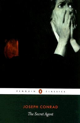Cover image of "The Secret Agent: A Simple Tale" book by Penguin Group featuring a mysterious illustration and title text.