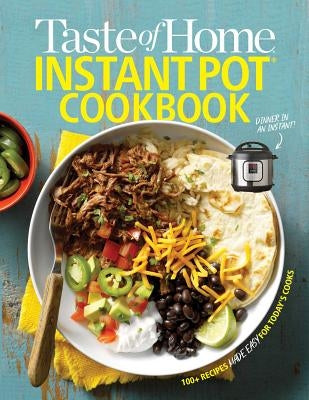 Paperback cookbook titled "Taste of Home Instant Pot" with 111 easy recipes for Instant Pot cooking, from Trusted Media Brands.