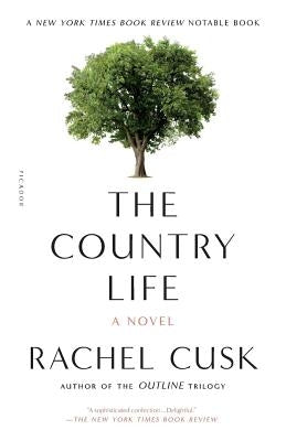 Paperback copy of The Country Life novel by Picador USA featuring a cover with pastoral landscape art.