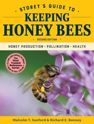 Paperback book titled "Storey's Guide to Keeping Honey Bees, 2nd Edition" with cover image showing bees and hive illustrations.