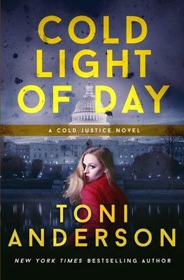Paperback copy of Cold Light of Day by Toni Anderson, featuring a dark, atmospheric cover with moody imagery.