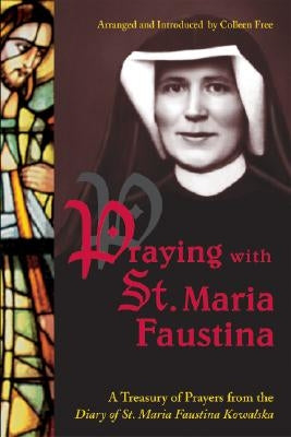 Paperback book titled "Praying with St. Maria Faustina" by Marian Press, featuring a cover with religious artwork and prayer symbols.