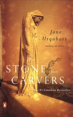 Paperback of The Stone Carvers by Penguin Publishing Group, featuring the book cover with stone carving artwork.