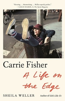 Paperback of "Carrie Fisher: A Life on the Edge" biography by Picador USA, featuring the book cover with Carrie Fisher's image.