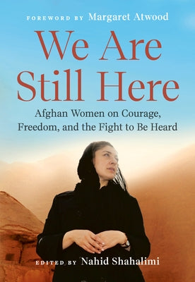 Paperback book titled "We Are Still Here" by Plume Books, featuring Afghan women on courage, freedom, and resilience.
