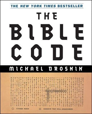 Open copy of The Bible Code book by Atria Books, showing pages with Hebrew text and coded messages in the interior.