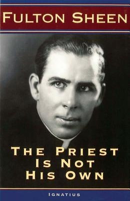 Paperback copy of "The Priest Is Not His Own" by Ignatius Press, featuring the book cover with religious imagery.