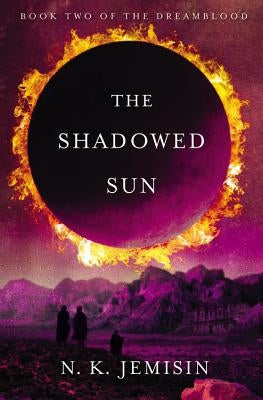 Paperback of The Shadowed Sun by Orbit featuring dark cover art with celestial and shadowy imagery.
