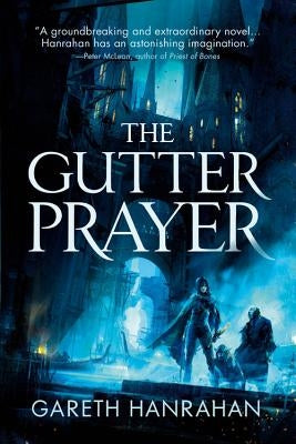 Paperback copy of The Gutter Prayer novel by Orbit, featuring dark fantasy cover art and title text.