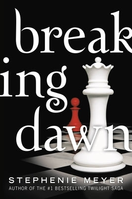 Paperback copy of "Breaking Dawn" by Little, Brown Books for Young Readers, featuring its cover with dark and mysterious artwork.