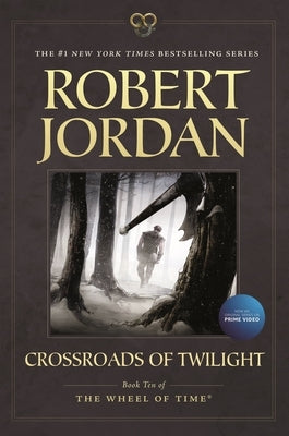 Paperback copy of Crossroads of Twilight by Tor Books, Book Ten of The Wheel of Time fantasy series, with cover art and title visible.