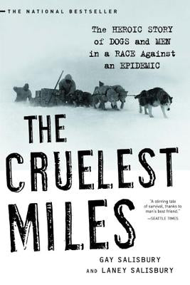 Paperback of The Cruelest Miles book showing the cover with illustrations and title about dogs and men in a race against an epidemic.