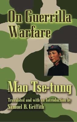 Open book titled "On Guerilla Warfare" by Dover Publications, showing pages with text and diagrams.