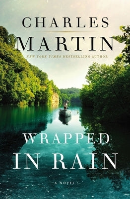 Paperback copy of "Wrapped in Rain" by Thomas Nelson featuring a colorful, rain-themed cover design.