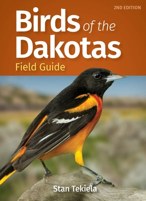 Birds of the Dakotas field guide by Adventure Publications showing colorful illustrations of various bird species in natural habitats.
