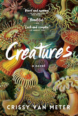 Paperback copy of "Creatures" by Algonquin Books, featuring the book cover with colorful artwork and title text.