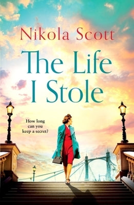 Paperback of The Life I Stole by Headline, showing the book cover with title and author on a plain background.