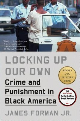 Paperback book titled "Locking Up Our Own: Crime and Punishment in Black America" by Farrar, Straus and Giroux, with a cover image.