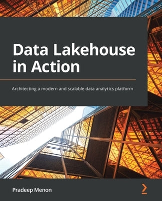 Paperback book titled "Data Lakehouse in Action" by Packt Publishing, featuring a modern data analytics platform on the cover.