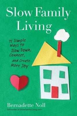 Paperback book titled "Slow Family Living" by Penguin, featuring a calming cover design with cozy family imagery.