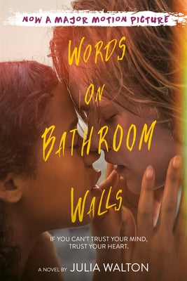 Paperback of "Words on Bathroom Walls" by Ember featuring a book cover with title and artwork in a close-up shot.