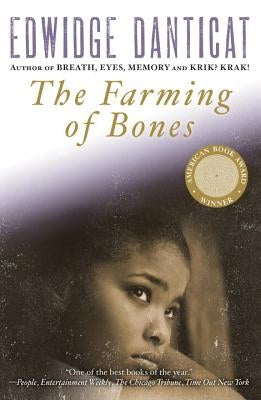 Paperback copy of The Farming of Bones by Soho Press featuring the book cover with title and author details.