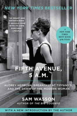 Paperback book titled "Fifth Avenue, 5 A.M." by Harper Perennial featuring Audrey Hepburn and Breakfast at Tiffany's on the cover.