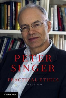 Paperback of Practical Ethics by Cambridge University Press, featuring a close-up of the book cover with text and design elements.
