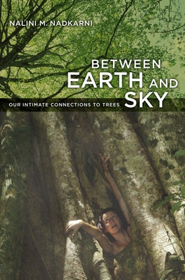 Paperback copy of "Between Earth and Sky: Our Intimate Connections to Trees" by University of California Press, showing the book cover.