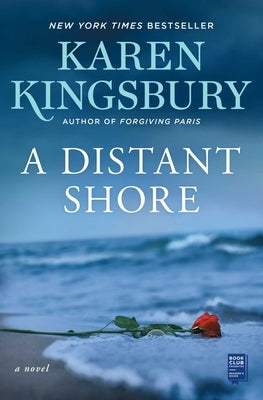 A paperback copy of "A Distant Shore" by Atria Books, featuring the book cover with ocean and shoreline imagery.