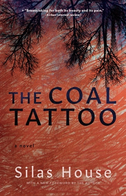 Blair The Coal Tattoo jewelry piece featuring a dark, textured coal-inspired pendant on a silver chain.