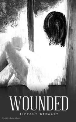 Wounded Paperback Libresco Feeds Private Limited