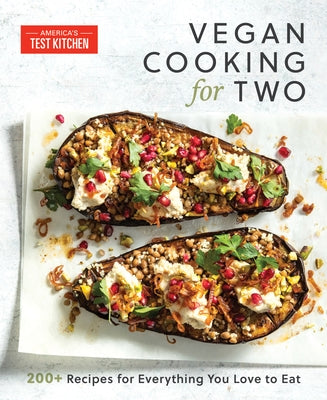 Vegan Cooking for Two paperback cookbook by America's Test Kitchen showing colorful recipe pages and cover.