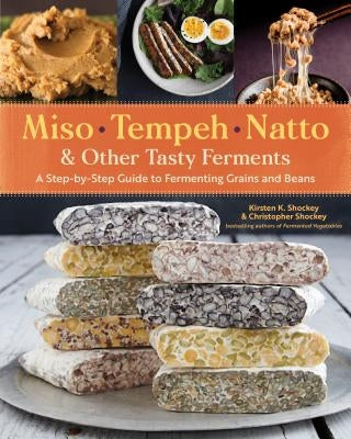 Paperback book titled "Miso, Tempeh, Natto & Other Tasty Ferments" showing colorful cover with fermented foods on a rustic table.