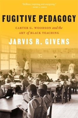 Paperback book titled Fugitive Pedagogy by Carter G. Woodson on Black teaching, published by Harvard University Press.