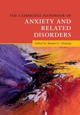 Paperback book titled The Cambridge Handbook of Anxiety and Related Disorders by Cambridge University Press, with a blue cover.