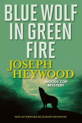 Blue Wolf in Green Fire: A Woods Cop Mystery Paperback Lyons Press