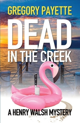 Paperback of "Dead in the Creek" by 8 Flags Publishing, Inc., showing the book cover with dark and eerie imagery.