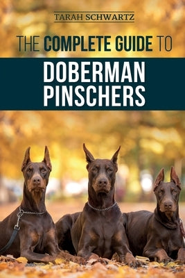 The Complete Guide to Doberman Pinschers: Preparing for, Raising, Training, Feeding, Socializing, and Loving Your New Doberman Puppy Paperback LP Media Inc.