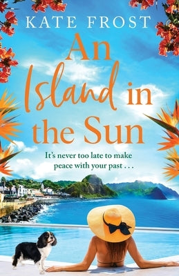 Paperback novel "An Island in the Sun" by Boldwood Books Ltd featuring a scenic island sunset on the cover.