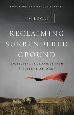 Paperback book titled "Reclaiming Surrendered Ground" by Moody Publishers, focusing on spiritual protection for families.