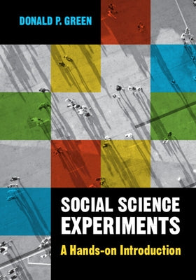 Paperback of Social Science Experiments: A Hands-On Introduction by Cambridge University Press, showing the book cover with educational graphics.